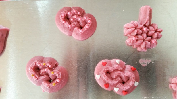 hh1  Raspberry Thumbprint Valentine’s Spritz Cookies cookie press w © 2018 Impress! Bakeware, LLC.jpg